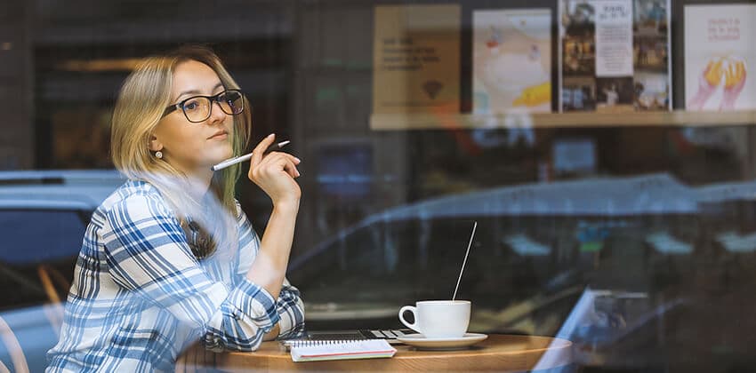 freelancer working at a cafe